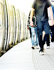 door,window, waiting, step, railway station,platform,wide,sign,diminishing,pedestrian,commuter,young,young adult,man,summer,shadow,bright,Stockholm,sweden,europe,traveller,sunlight,passenger,train,tube,leaving,walking,railway,motion,blur,crowd,rush hour,phone,waiting,shoe,leg,stand,wait